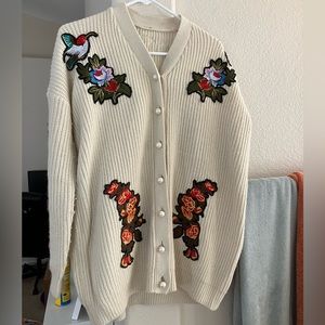 Dressed in LALA patched cardigan